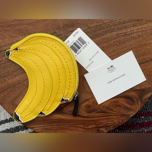 Coach Handbags - COACH Banana Coin Purse - NWT
- CALLOUTS
